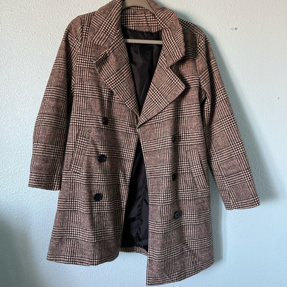 Brown Plaid Double Breasted Coat with a Collared Neckline and Long Sleeves